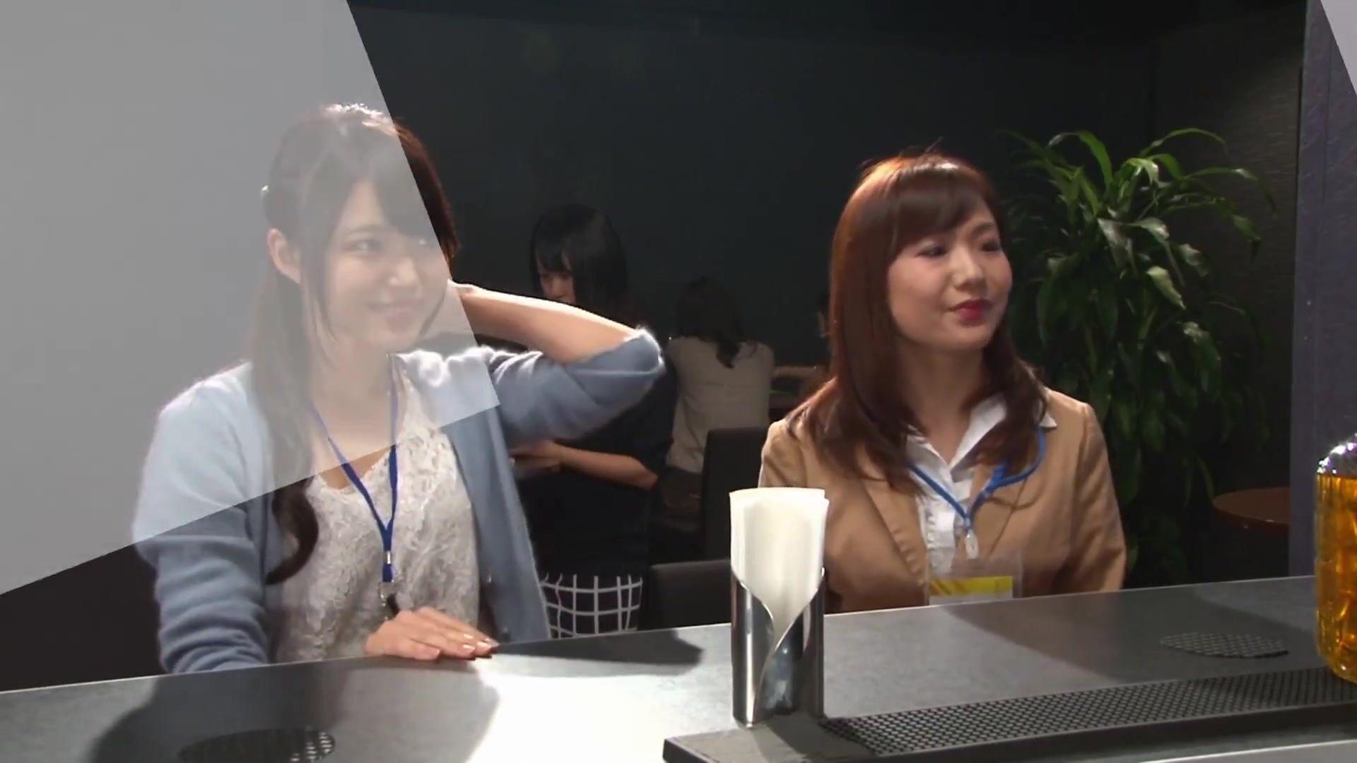 2 coworkers have a drink together